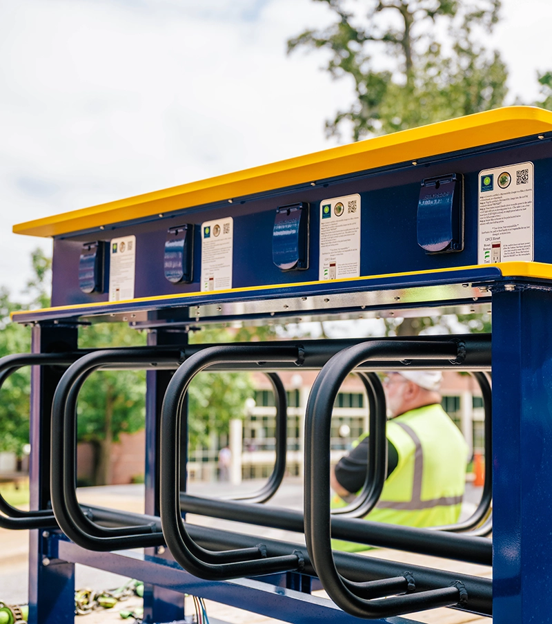 A UNCG themed solar-powered charging station where students can charge their electric micromobility devices.